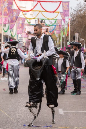 LOULE, PORTUGAL - FEB 2016: Colorful Carnival (Carnaval) Parade festival participants on Loule city, Portugal.のeditorial素材
