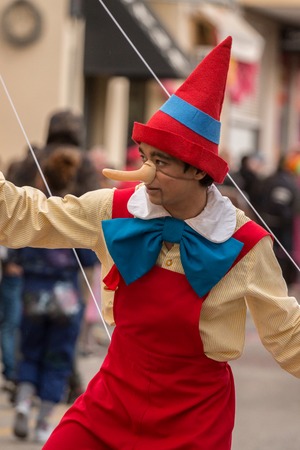 LOULE, PORTUGAL - FEB 2016: Colorful Carnival (Carnaval) Parade festival participants on Loule city, Portugal.のeditorial素材