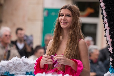LOULE, PORTUGAL - FEB 2016: Colorful Carnival (Carnaval) Parade festival participants on Loule city, Portugal.のeditorial素材