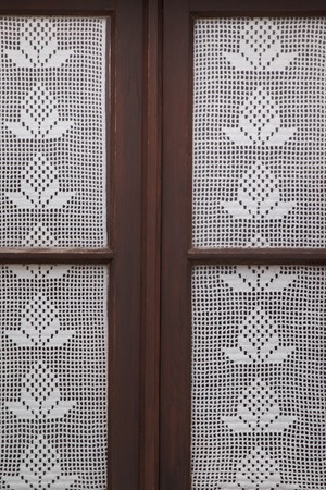Close up view of a traditional portuguese window on a house.の写真素材