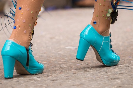 Close up view of carnival dancer legs of a girl.