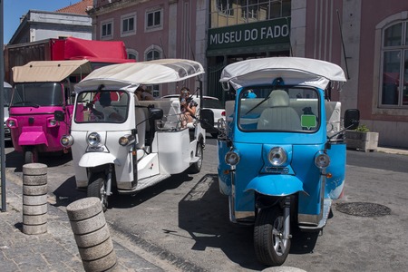 Typical Tuk Tuk motorcycles for transporting tourists in Lisbon, Portugal.のeditorial素材