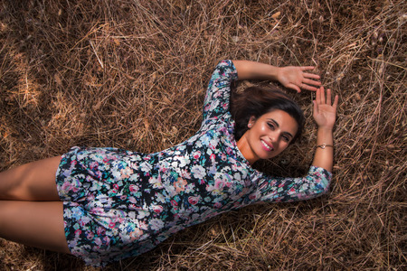 Beautiful girl in a nature autumn theme.の写真素材