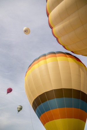 View of the ascension of colorful hot air balloons festival.の写真素材