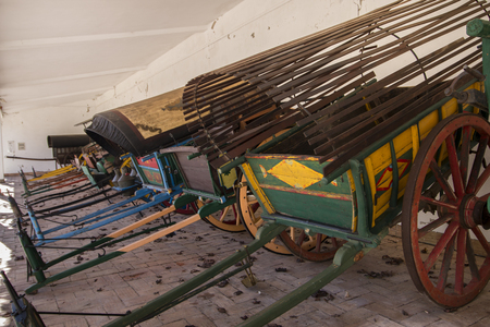 Exhibit of old transport carts in a museum of Sao Bras de Alportel, Portugal.のeditorial素材