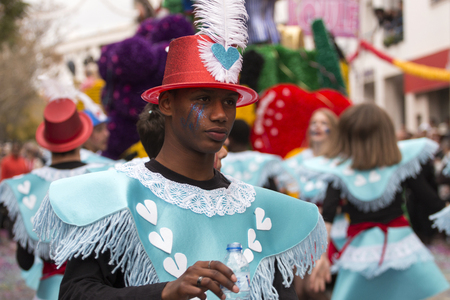 LOULE, PORTUGAL - FEB 2017: Colorful Carnival (Carnaval) Parade festival participants on Loule city, Portugal.のeditorial素材