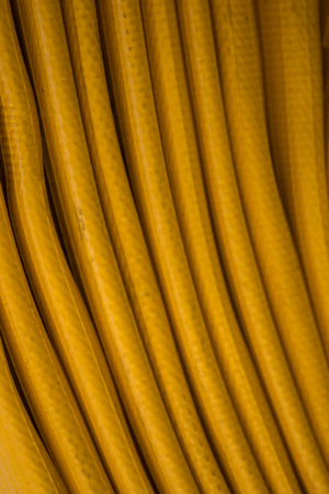 Yellow Fire hose on a tall ship.の写真素材