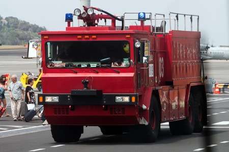 Close view of a Red airport fire engine, emergency vehicle.のeditorial素材