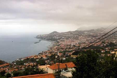 Wide view of Funchal city, located in Madeira island, Portugal.の写真素材