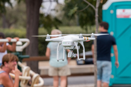 View of a small consumer quadrocopter drone in flight.のeditorial素材