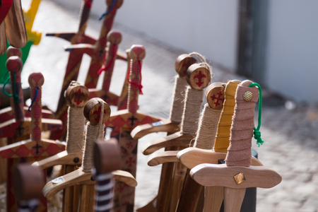 Toy wooden swords in Medieval fair.の写真素材