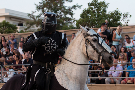 SILVES, PORTUGAL - August 13th, 2017 : Medieval warrior with horse in Medieval fair event.のeditorial素材