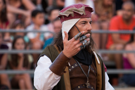 SILVES, PORTUGAL - August 13th, 2017 : Medieval costume character in Medieval fair event.のeditorial素材