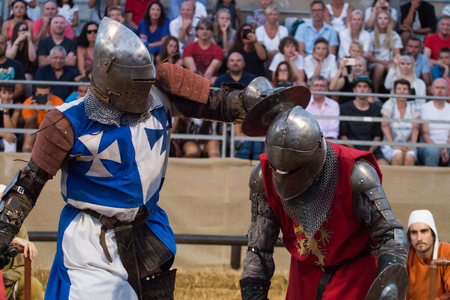 SILVES, PORTUGAL - August 13th, 2017 : Medieval warriors in battle in Medieval show.のeditorial素材