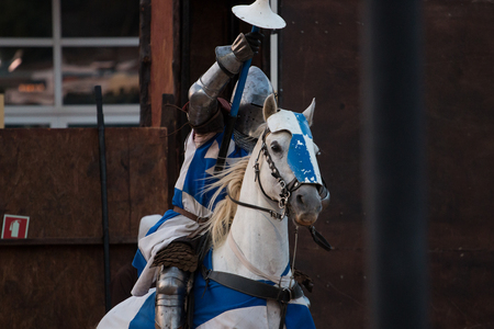 SILVES, PORTUGAL - August 13th, 2017 : Medieval warrior with horse in Medieval fair event.のeditorial素材