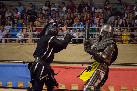 SILVES, PORTUGAL - August 13th, 2017 : Medieval warriors in battle in Medieval show.のeditorial素材