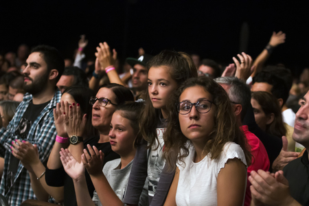 FARO, PORTUGAL: 01st SEPTEMBER, 2017 - Audience watching the music band, Rui Veloso, performing on Festival F, a big festival on the city of Faro, Portugal.のeditorial素材