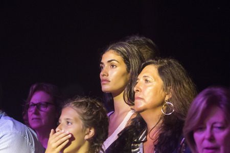 FARO, PORTUGAL: 01st SEPTEMBER, 2017 - Audience watching the music band, Rui Veloso, performing on Festival F, a big festival on the city of Faro, Portugal.のeditorial素材