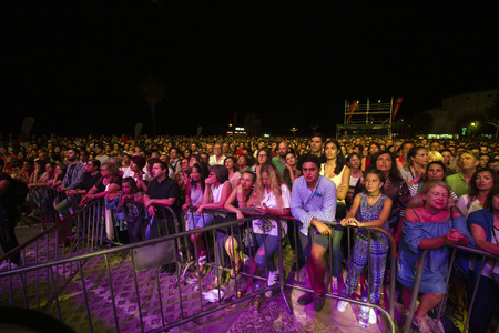 FARO, PORTUGAL: 01st SEPTEMBER, 2017 - Audience watching the music band, Rui Veloso, performing on Festival F, a big festival on the city of Faro, Portugal.のeditorial素材