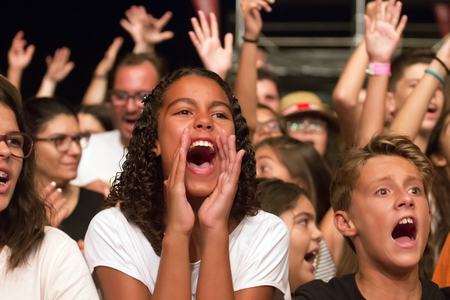 FARO, PORTUGAL: 03rd SEPTEMBER, 2017 - Audience watching the music band, HMB, performing on Festival F, a big festival on the city of Faro, Portugal.のeditorial素材
