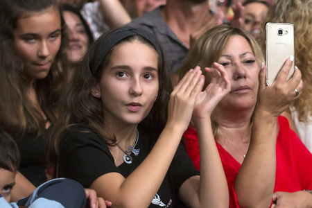 FARO, PORTUGAL: 03rd SEPTEMBER, 2017 - Audience watching the music band, HMB, performing on Festival F, a big festival on the city of Faro, Portugal.のeditorial素材