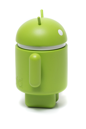 OLHAO, PORTUGAL - 6th november, 2017 - Famous Android mini collectible figure, that represents the mobile operating system developed by Google isolated on a white background.のeditorial素材