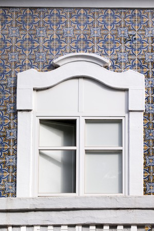 Beautiful classic window of the Algarve region, Portugal.の写真素材