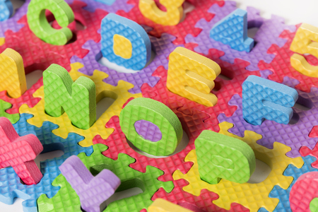 Close up view of foam puzzle letter uppercase game.の写真素材
