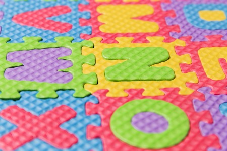 Close up view of foam puzzle letter uppercase game.