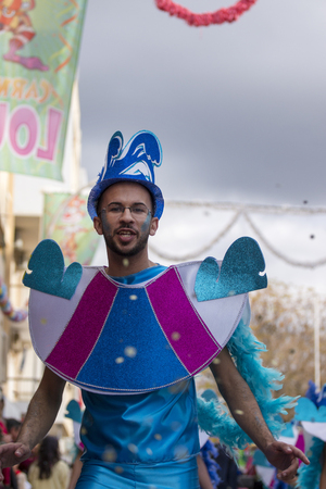 LOULE, PORTUGAL - FEB 2018: Colorful Carnival (Carnaval) Parade festival participants on Loule city, Portugal.のeditorial素材