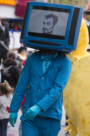 LOULE, PORTUGAL - FEB 2018: Colorful Carnival (Carnaval) Parade festival participants on Loule city, Portugal.のeditorial素材