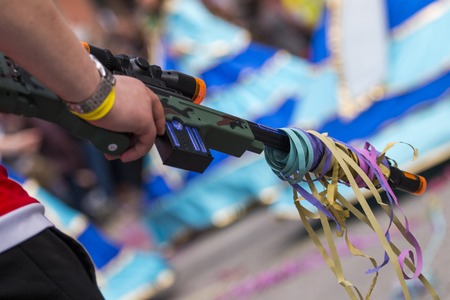 Close up view of a fake toy gun in Carnival parade