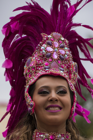 LOULE, PORTUGAL - FEB 2018: Colorful Carnival (Carnaval) Parade festival participants on Loule city, Portugal.のeditorial素材