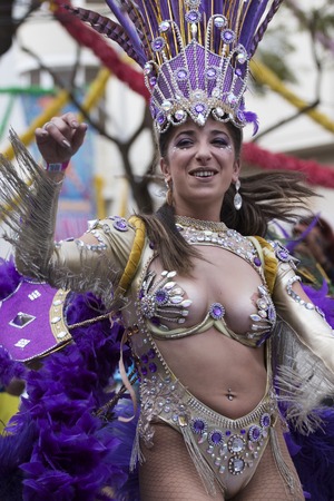 LOULE, PORTUGAL - FEB 2018: Colorful Carnival (Carnaval) Parade festival participants on Loule city, Portugal.のeditorial素材