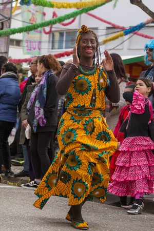LOULE, PORTUGAL - FEB 2018: Colorful Carnival (Carnaval) Parade festival participants on Loule city, Portugal.のeditorial素材