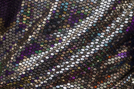 Close up view of a highly reflective texture of Carnival suit.の写真素材