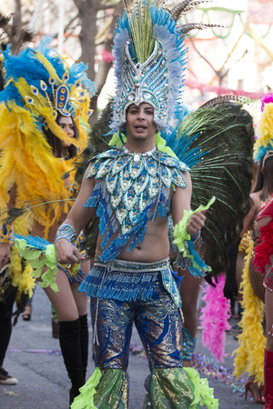 LOULE, PORTUGAL - FEB 2018: Colorful Carnival (Carnaval) Parade festival participants on Loule city, Portugal.のeditorial素材