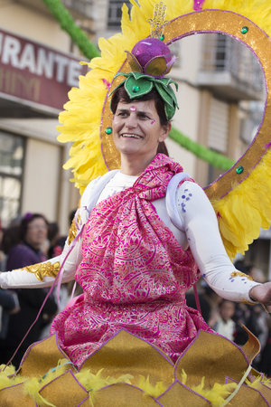LOULE, PORTUGAL - FEB 2018: Colorful Carnival (Carnaval) Parade festival participants on Loule city, Portugal.のeditorial素材