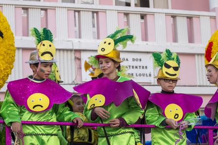 LOULE, PORTUGAL - FEB 2018: Colorful Carnival (Carnaval) Parade festival participants on Loule city, Portugal.のeditorial素材