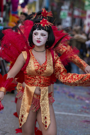 LOULE, PORTUGAL - FEB 2018: Colorful Carnival (Carnaval) Parade festival participants on Loule city, Portugal.のeditorial素材