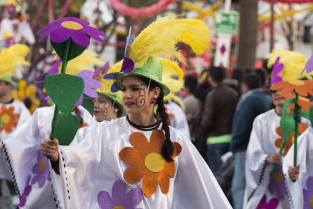 LOULE, PORTUGAL - FEB 2018: Colorful Carnival (Carnaval) Parade festival participants on Loule city, Portugal.のeditorial素材