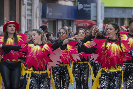 LOULE, PORTUGAL - FEB 2018: Colorful Carnival (Carnaval) Parade festival participants on Loule city, Portugal.のeditorial素材