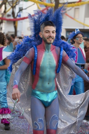 LOULE, PORTUGAL - FEB 2018: Colorful Carnival (Carnaval) Parade festival participants on Loule city, Portugal.のeditorial素材