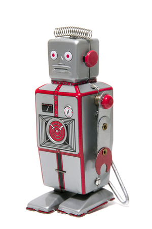 Vintage tin robot toy isolated on a white background.の写真素材