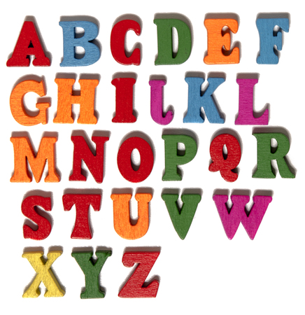 Wooden colorful letters isolated on a white background.の写真素材
