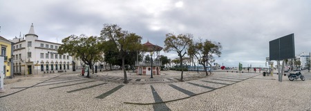 FARO, PORTUGAL: 4th of March, 2018 - Panorama of historical downtown of Faro city on the garden Manuel Bivar and the docks.のeditorial素材