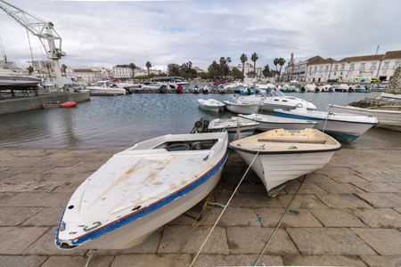 Wide view of Faro city docks with fishing and recreational boats.の写真素材