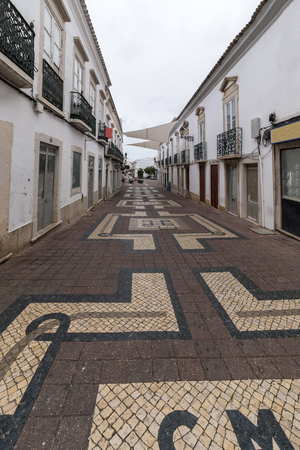 FARO, PORTUGAL: 4th of March, 2018 - Street of Conselheiro Bivar in Faro city  that includes many drinking and dance bars, popular to young teenagers.のeditorial素材