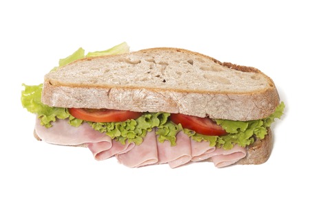 sandwich with ham over a white background.の写真素材