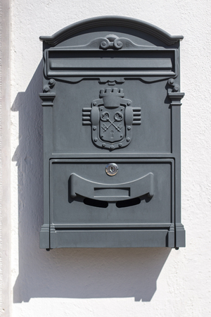 Close up view of a urban wall mailbox.の写真素材